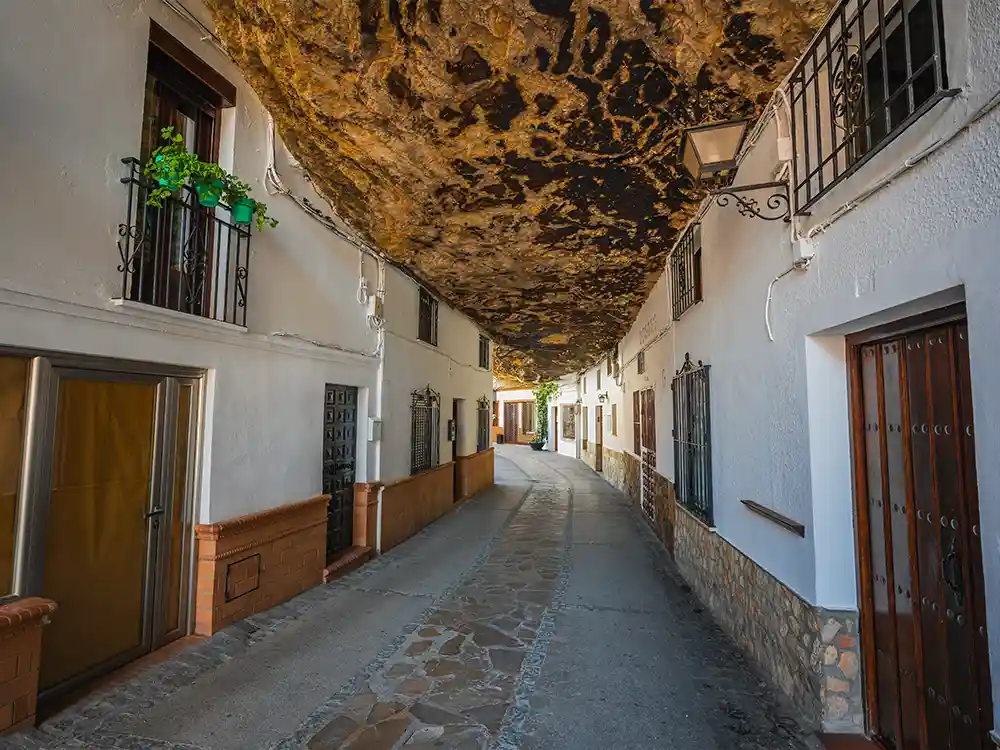 shade cave street in setenil de las bodegas, spain